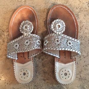Size 1 Jack Rogers shimmery platinum sandals.